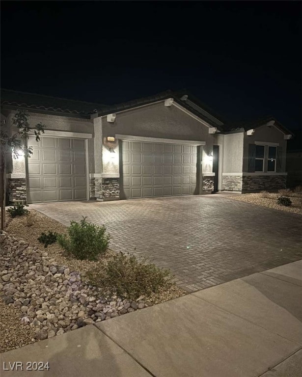 view of front of property featuring a garage