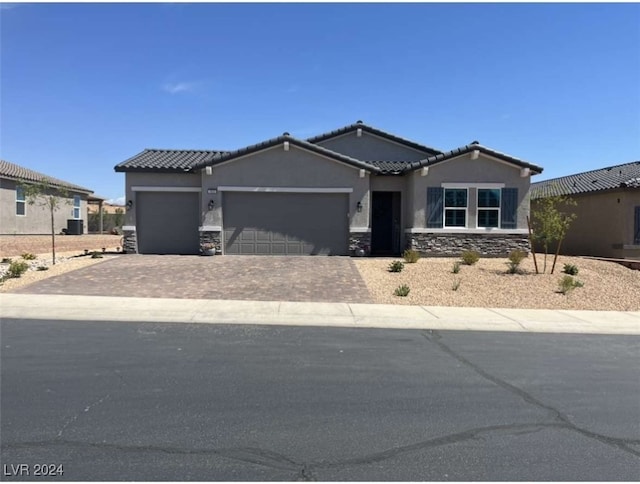 view of front of house with a garage