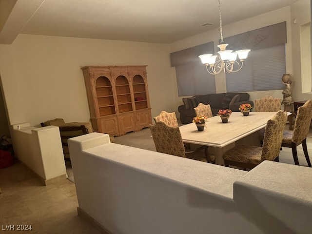 dining room featuring a chandelier