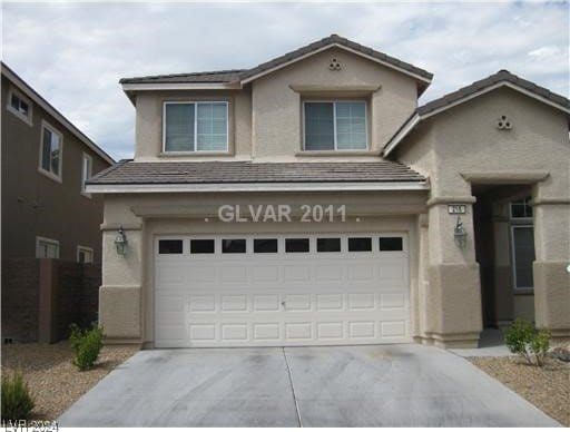 front of property featuring a garage