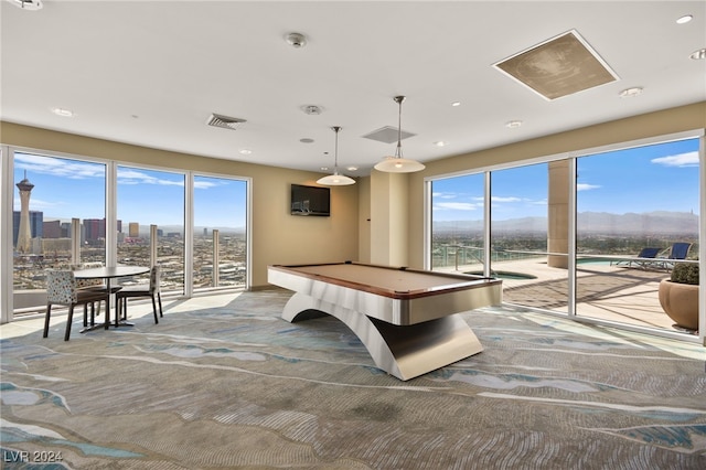 rec room with carpet floors, billiards, and a wealth of natural light