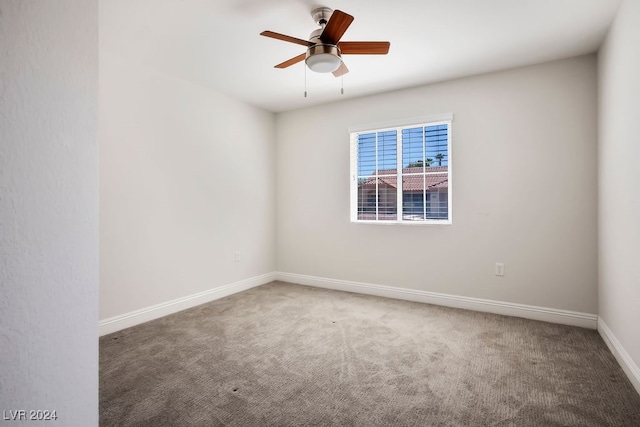 carpeted empty room with ceiling fan