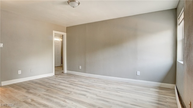 empty room with light wood-type flooring