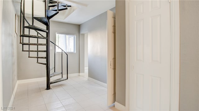 staircase with tile patterned flooring