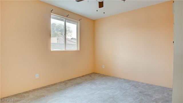 empty room featuring ceiling fan