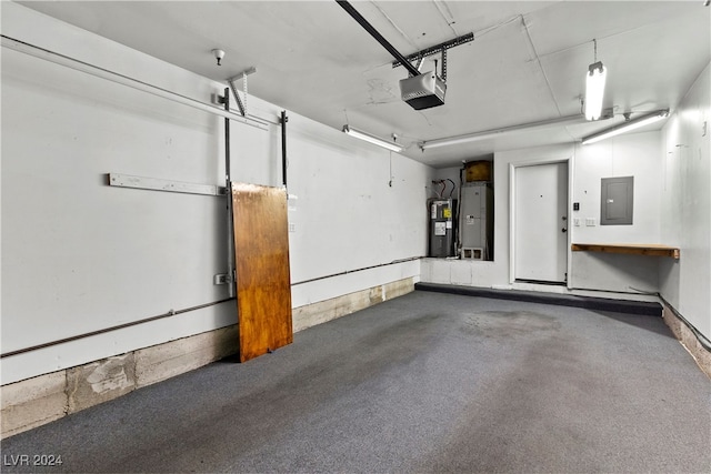 garage featuring a garage door opener, electric panel, and electric water heater