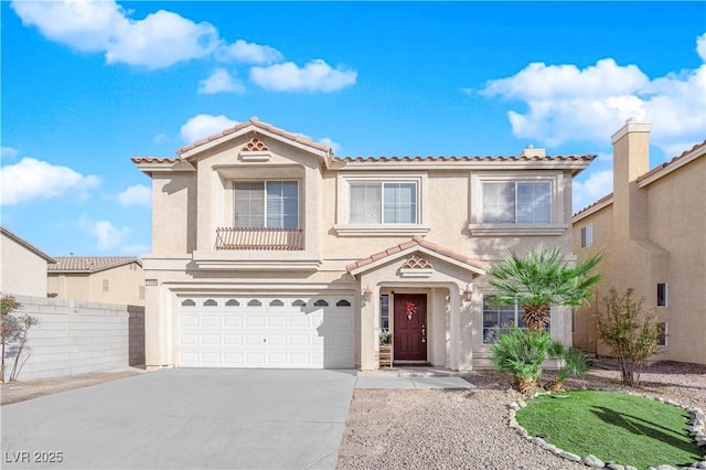 view of front of property featuring stucco siding, driveway, fence, an attached garage, and a tiled roof