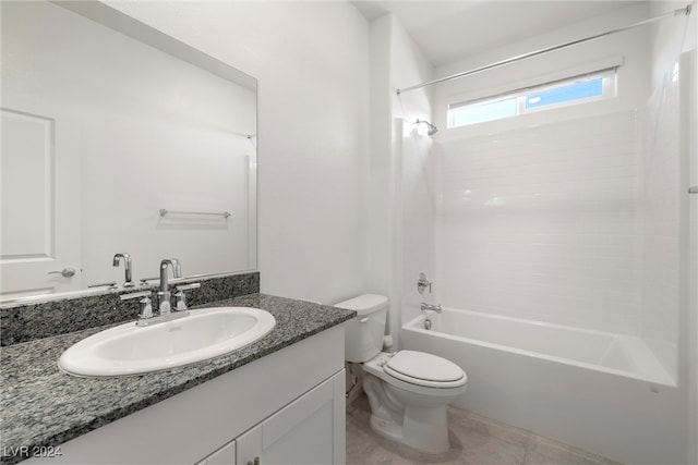 full bathroom with toilet, vanity, and  shower combination