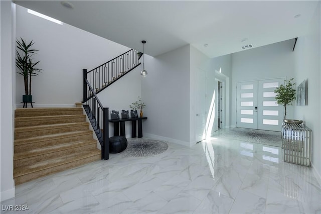 510 Duvet Ct, Henderson, NV 89012 - staircase with visible vents, baseboards, french doors, and marble finish floor