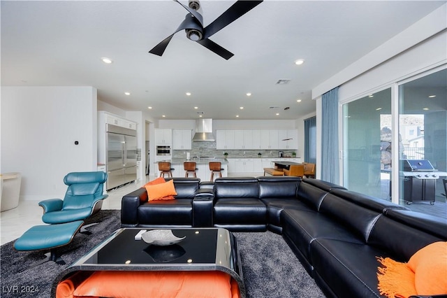 living room featuring ceiling fan