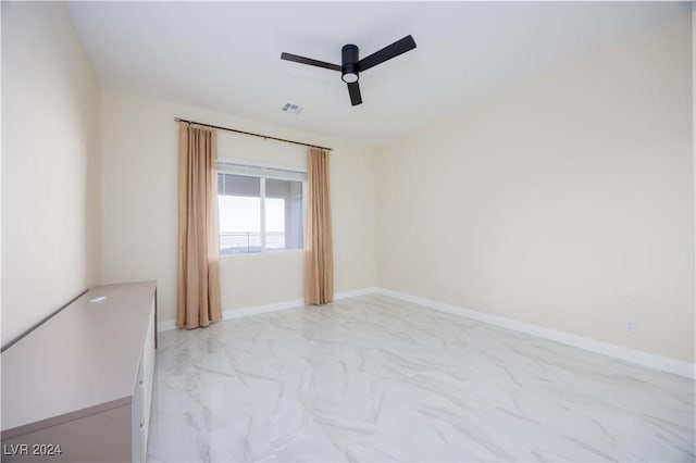 510 Duvet Ct, Henderson, NV 89012 - empty room with visible vents, marble finish floor, baseboards, and ceiling fan