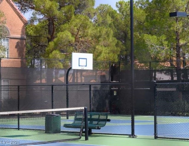 view of tennis court with basketball court