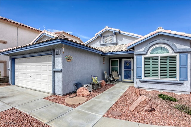 view of front of house with a garage