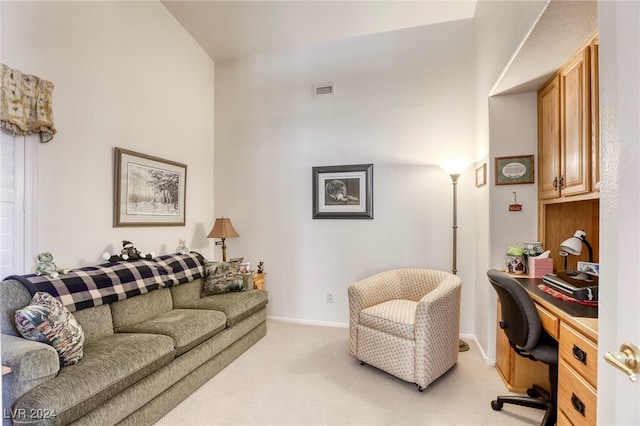 living room with light colored carpet