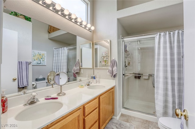 bathroom with vanity, toilet, and a shower with shower curtain