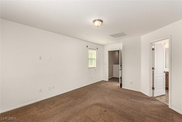 empty room with carpet floors