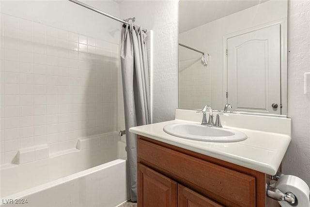 bathroom featuring vanity and shower / tub combo