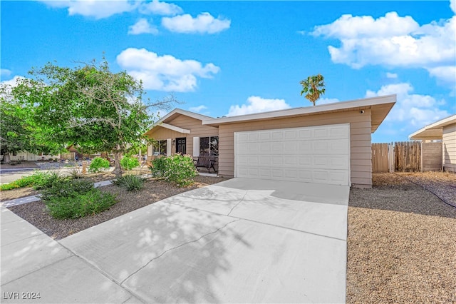 ranch-style home with a garage