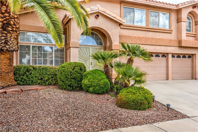 view of front of home featuring a garage