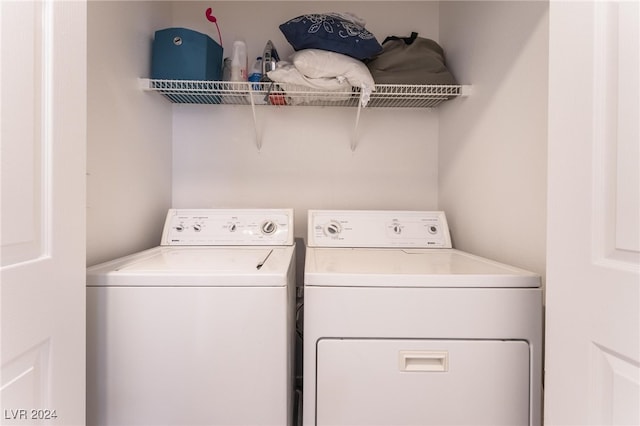 laundry area with independent washer and dryer