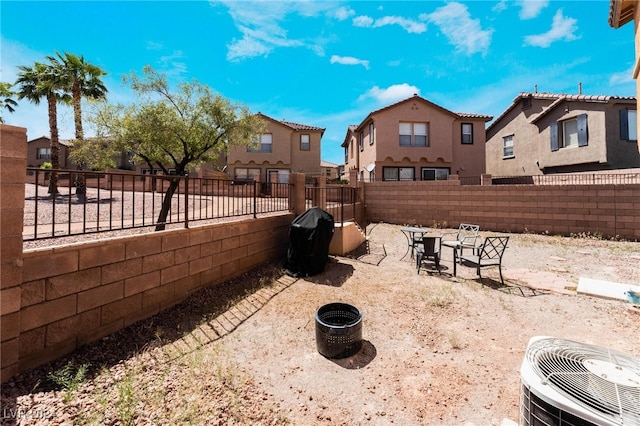 view of yard featuring a patio area and a fire pit