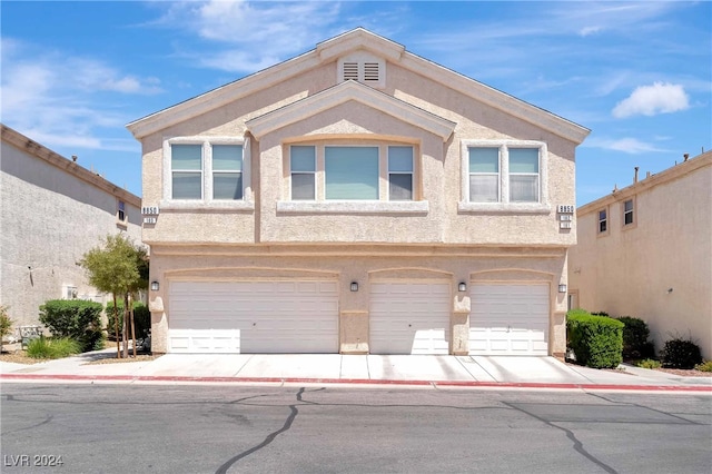 view of front of property featuring a garage