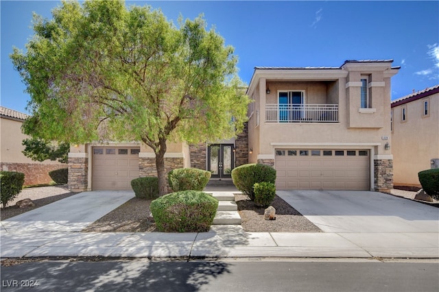 view of front of property with a garage