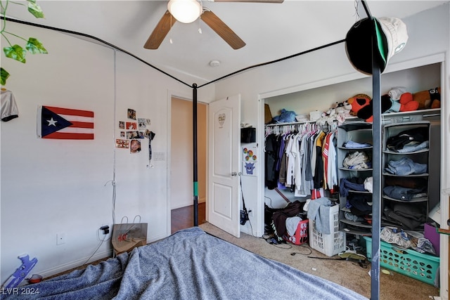 bedroom with ceiling fan, a closet, and carpet