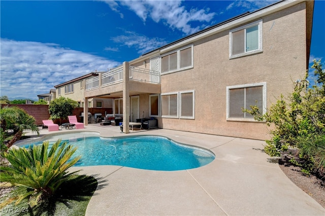 view of swimming pool featuring a patio area