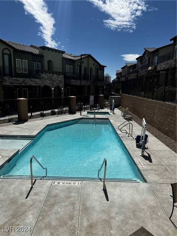 view of pool with a patio