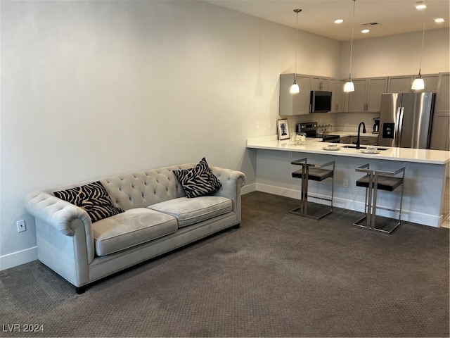 carpeted living room featuring sink