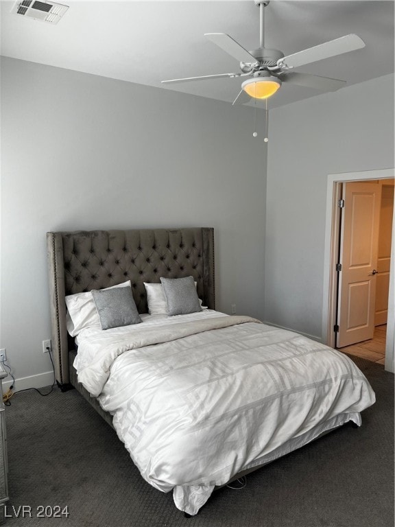 carpeted bedroom with ceiling fan