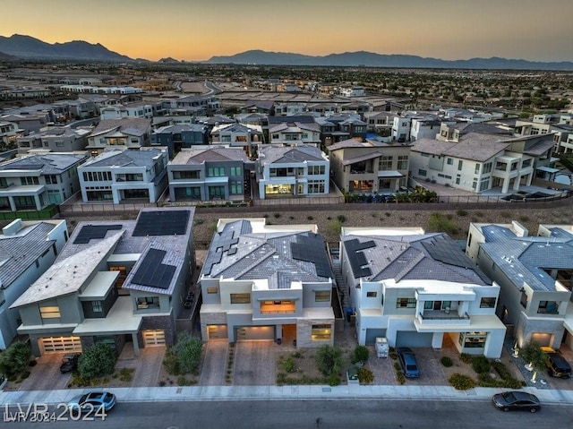 aerial view at dusk with a mountain view