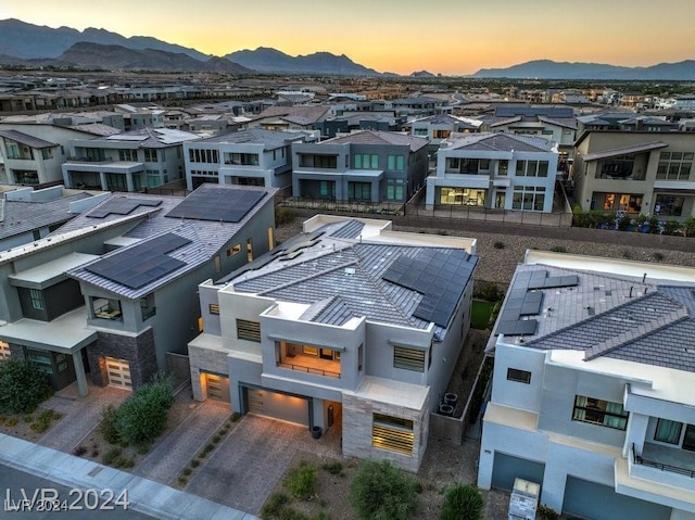 aerial view at dusk with a mountain view