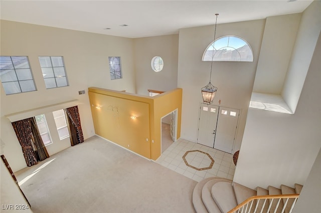 foyer featuring a high ceiling