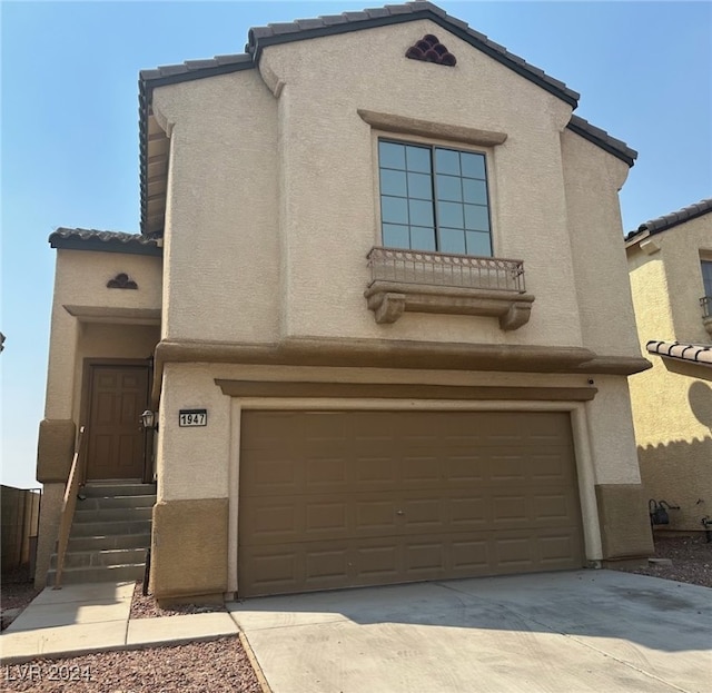 view of front of property featuring a garage