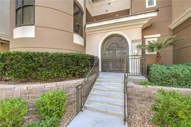 property entrance with a balcony