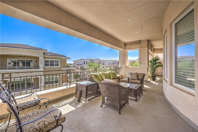 view of patio / terrace with a balcony and outdoor lounge area