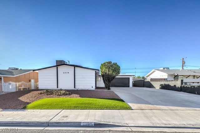 single story home featuring a garage