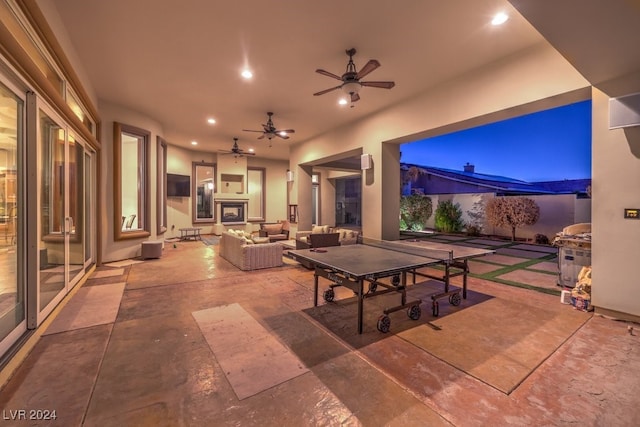 view of patio featuring ceiling fan and an outdoor hangout area