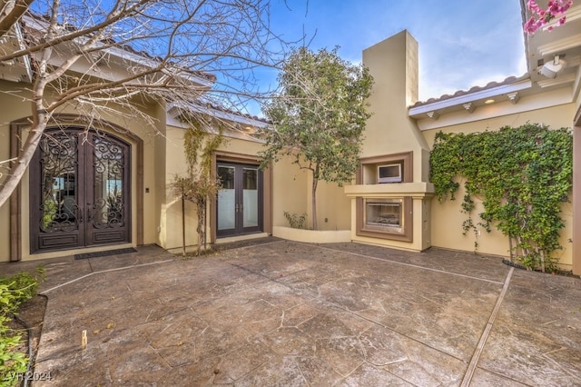 exterior space featuring a patio and french doors