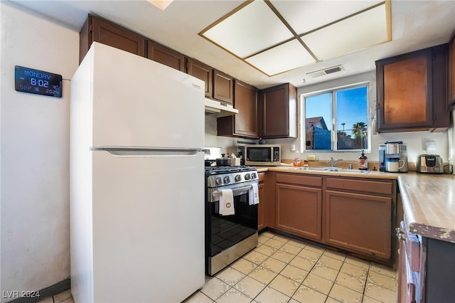 kitchen featuring stainless steel appliances and sink