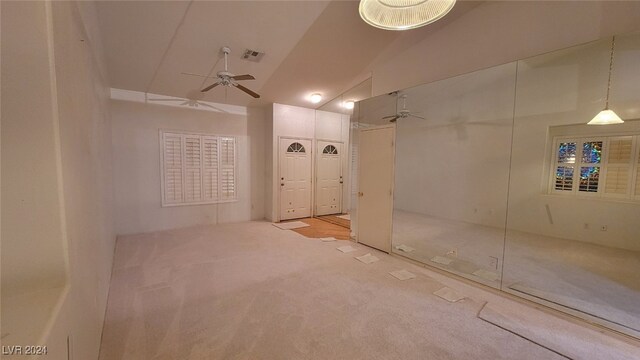 bathroom featuring vaulted ceiling and ceiling fan