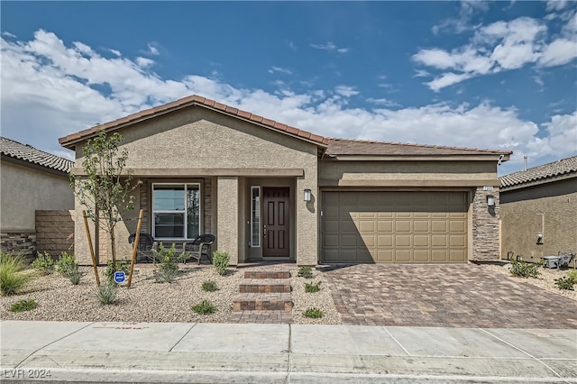 view of front of property featuring a garage