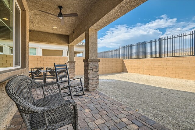 view of patio / terrace featuring ceiling fan