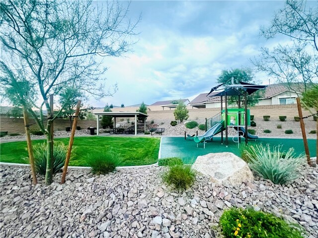 surrounding community featuring a playground