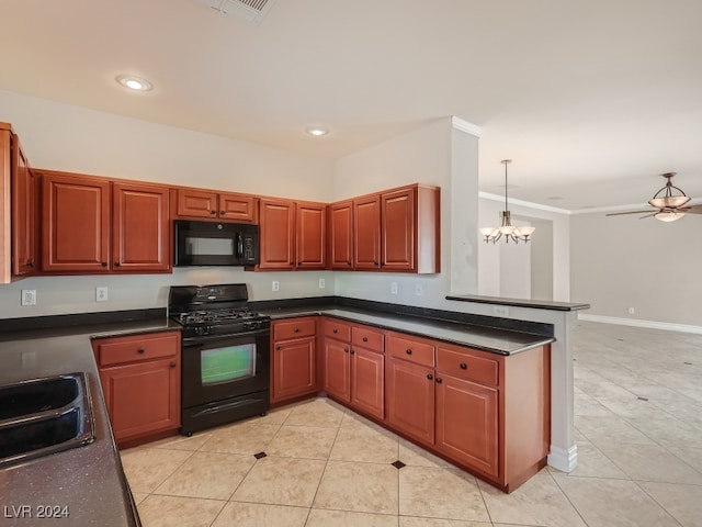 kitchen with black appliances, ceiling fan with notable chandelier, light tile patterned floors, and decorative light fixtures