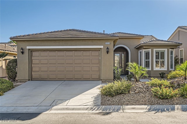 view of front of home featuring a garage