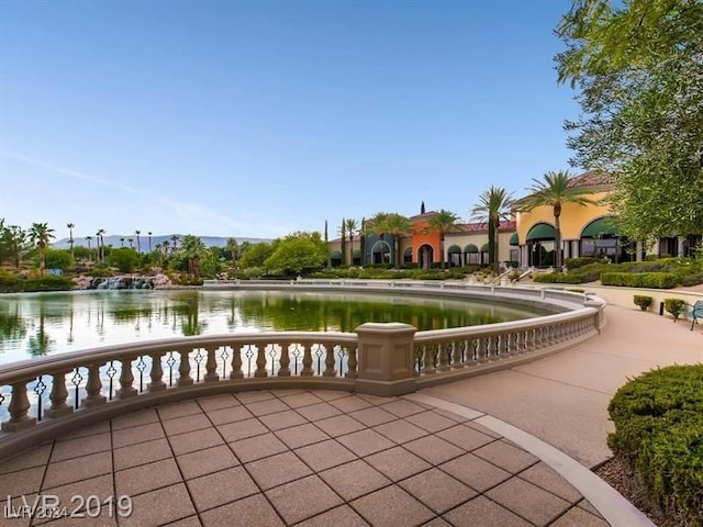 view of home's community with a water view