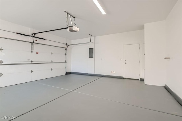 10315 Premia Pl, Las Vegas, NV 89135 - garage featuring electric panel and a garage door opener